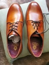 BRAND NEW IN BOX SIZE 7 MENS