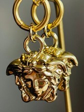 100% Versace Earrings head of