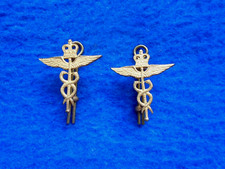PAIR ROYAL AIR FORCE MEDICAL BRANCH OFFICERS GILT "FLYING ANGEL" COLLAR BADGES