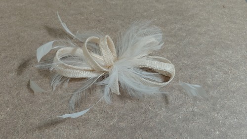 Cream sinamay and feather - sinamay,
