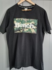 Bench, Men's Black T.shirt With "BENCH' Sat in A Camo Background Size XL