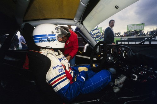 Rene metge sits his - his, porsche