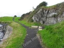 Photo 6x4 Seaside path, Moville Bun an Phobail See close-up of benches he c2011