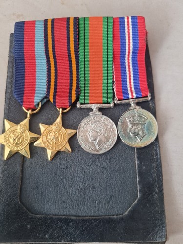 Mounted miniature medal groups - mounted,