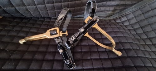 Spurs and spur - and, straps.