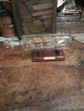 Golden Hind Blown Glass Ship in A Bottle. Measuring 22cm Long x 5.5cm Wide 