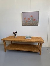 Large wicker cane coffee table with magazine shelf and glass top boho