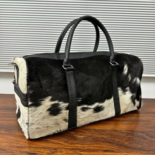 Hair cow hide duffle bag - on,