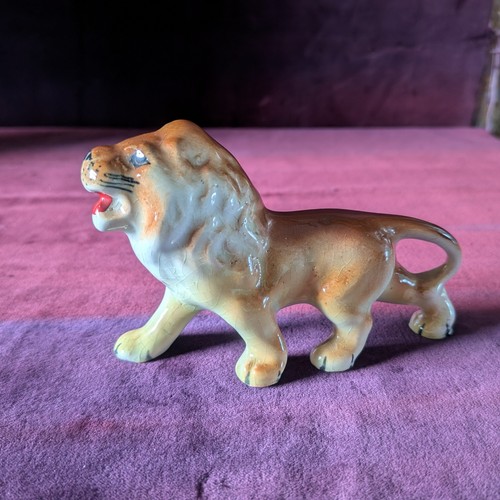 Antique pottery lion a - pottery, in