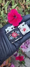 A Pair Of Ladies VINTAGE lighters 1950s Rolstar Flowers And  A Penguin Mini Rose