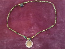 Jamaica Handmade Necklace with Uruguayan Puma Coin Made It With Wax Thread