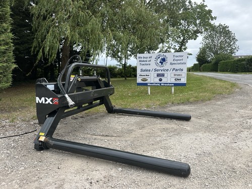 New round bale handler - bale, grab