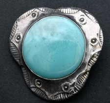 Turquoise Ruskin set in silver