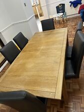 Extending dining table and chairs used 8, with Matching sideboard.