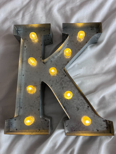 Marquee light monogram - up, k