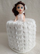 white knitted toilet roll doll