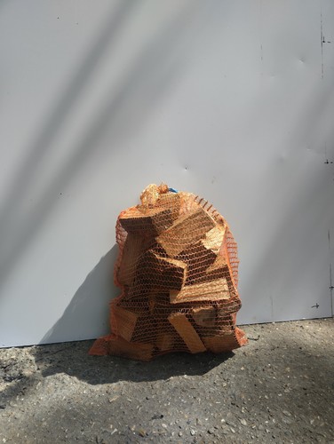Cherry logs split and - logs.,