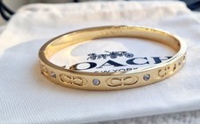 Coach Gold-toned Kissing C