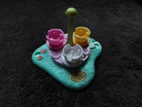 Polly pocket rides - pocket, n