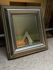 rectangular wall mirror with a