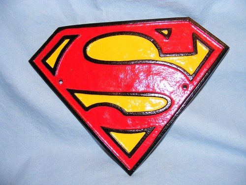 Superman logo sign - cast, iron