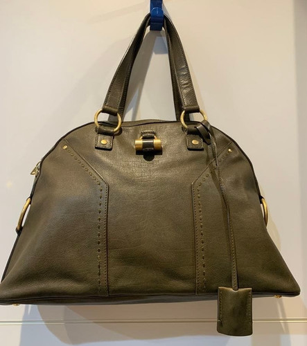 Yves saint laurent muse - laurent,