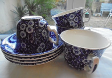 CALICO - 4 CUPS  & SAUCERS