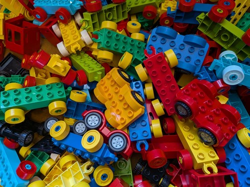 Duplo train and car wheel - and,
