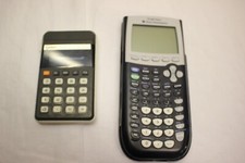 JOB LOT 2X CALCULATORS CASIO M1 ELECTRONIC & TEXAS INTSTRUMENTS TI-84PLUS FAULTY
