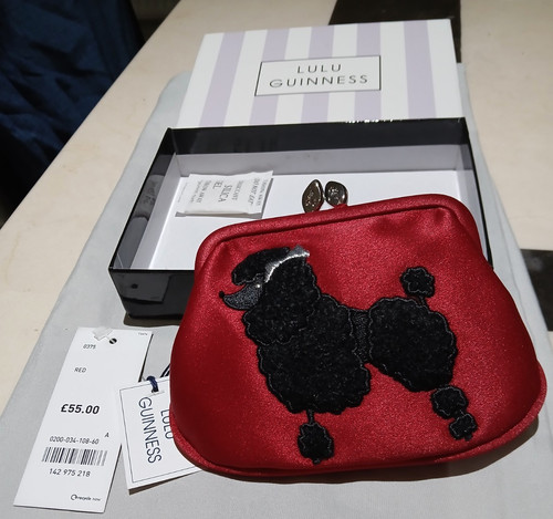 Lulu guiness poodle - lulu,