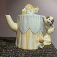 Cute Decorative TEAPOT TABLE WITH PLAYING KITTENS AND PUPPY.