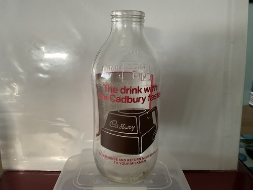 Vintage milk bottles with - milk,
