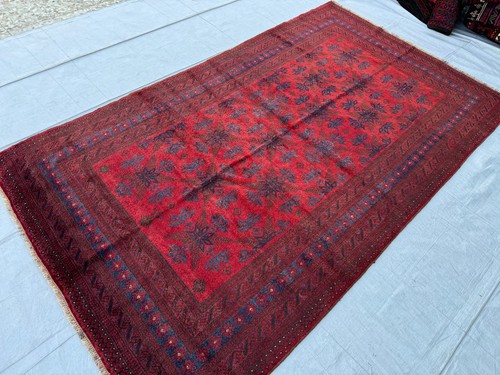 Red hand knotted afghan area - red,