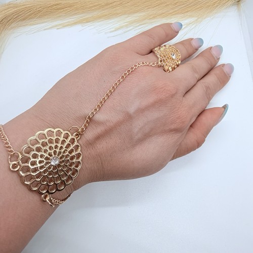 Gold hand chain bracelet ring - hand,