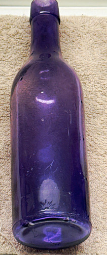 Vintage purple glass bottle - purple,