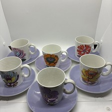 6 x Flower Power cups saucers
