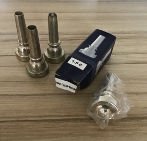 One new brass instrument - 1.5c,