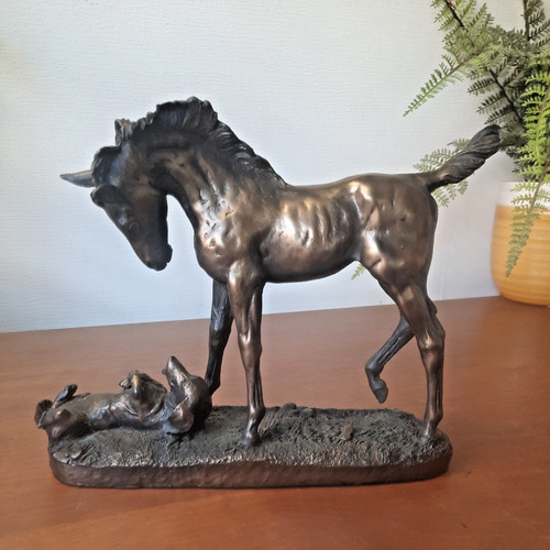 Foal and dog - and,