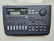 Vintage DigiTech Vocalist Workstation with 2-5 part stereo harmonies and reverb.