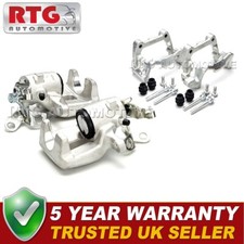 Pair Brake Calipers + Carriers