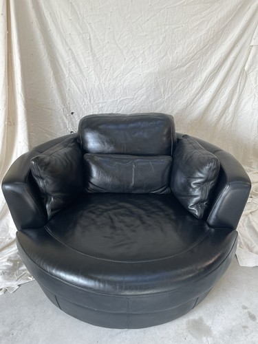 Two leather swivel cuddle - two,
