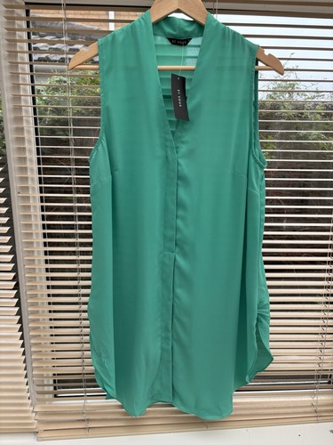 Green sleeveless blouse size - green,