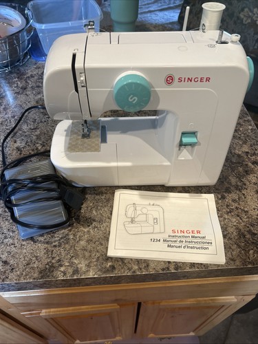 Gently used singer sewing - used,
