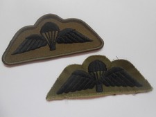 two vintage parachute jump