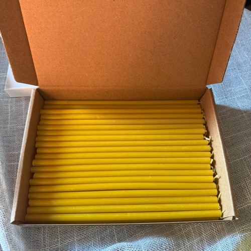 Thin yellow taper candles - yellow,