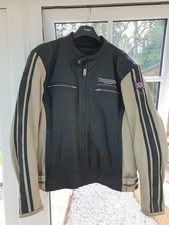 TRIUMPH LEATHER MOTORCYCLE JACKET IN BLACK AND BEIGE. SIZE 48/58.