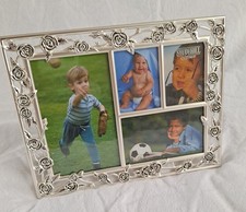 Metal, picture frame. fits 4 photos. New condition in original box.