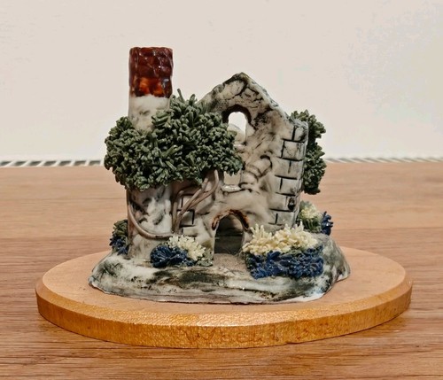 Unusual tiny ceramic model the - unusual,