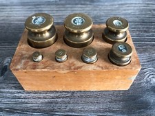 Set of 7 Brass Avery Weights 2 x 200g, 100g, 50g, 20g, 10g, 5g.