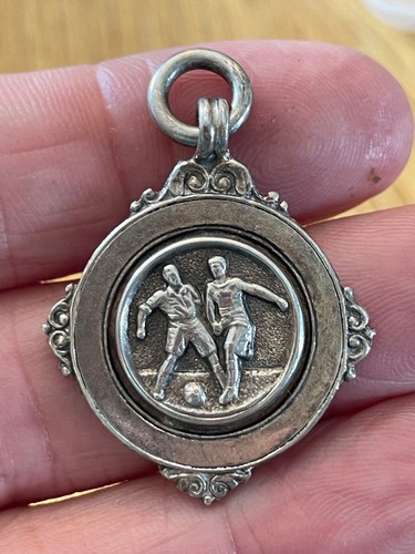 Antique solid silver football